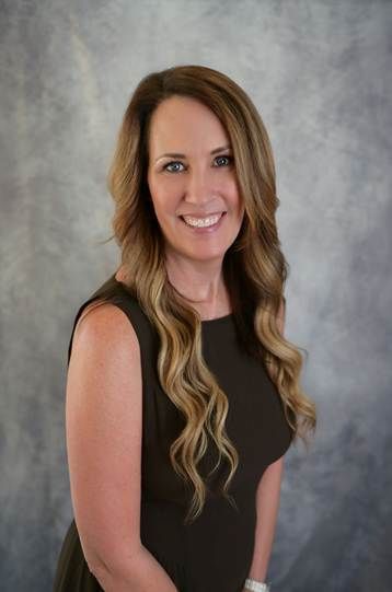 Christy Mathers, Secretary and COO of Iron Oak Home Loans