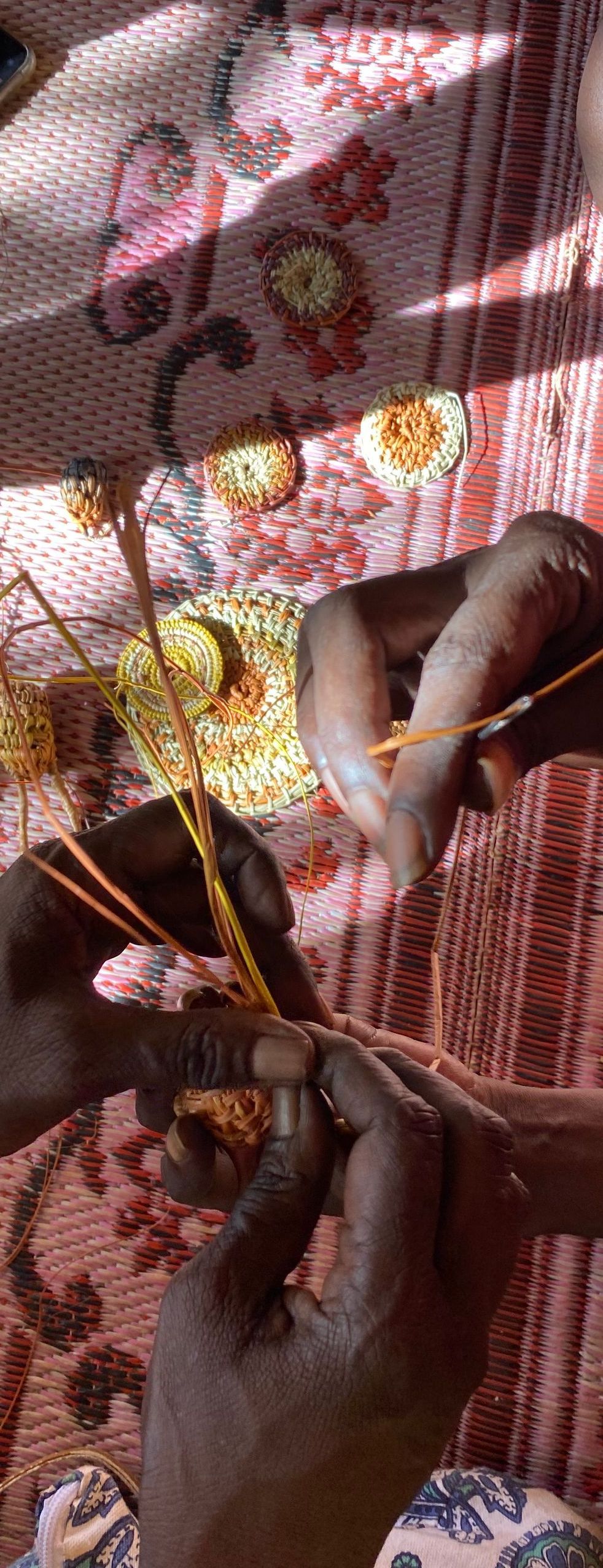 A person is holding a piece of string in their hands.