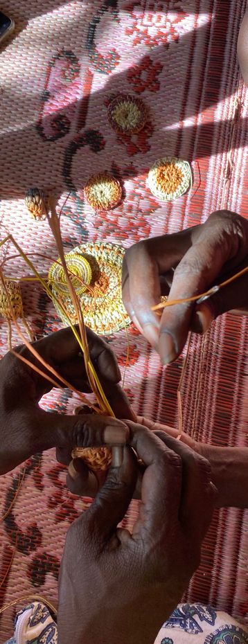 A person is holding a piece of string in their hands.