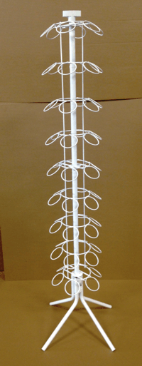 Tall white metal display rack with multiple circular hooks on a stand