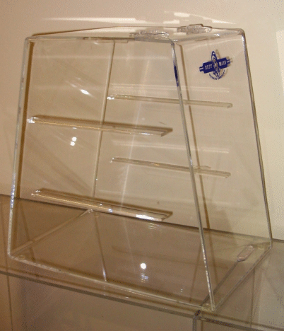 Clear acrylic display case with angled shelves and a blue logo on the top right