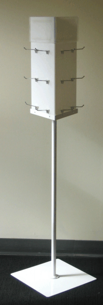 Tall white retail display stand with multiple small hooks on a square base