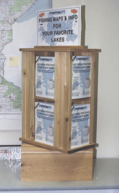 Wooden display stand holding fishing maps and information brochures for lakes