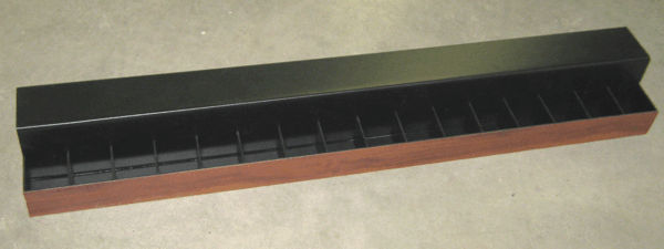 Black open display case with a row of small compartments on a brown base