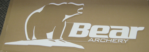 Bear Archery logo in white on a brown background, featuring a bear silhouette and a bow icon