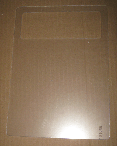 Brown cardboard packaging with a clear rectangular label area near the top