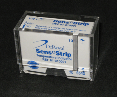Clear plastic dispenser holding DeRoyal SensiStrip temperature indicators, white and blue packaging