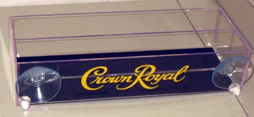 Clear acrylic display case with a dark blue Crown Royal base and logo, mounted on four clear wheels.