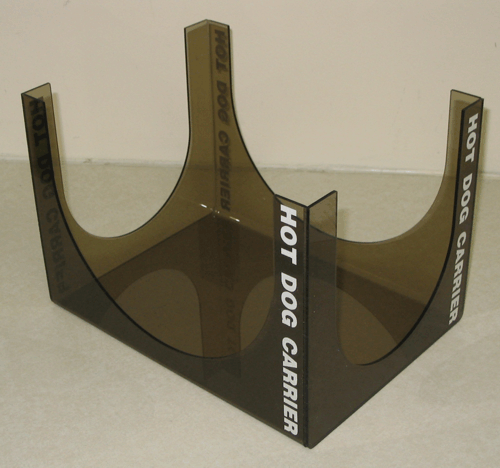 Brown acrylic dog carrier display stand with three U-shaped slots and “HOT DOG CARRIER” text