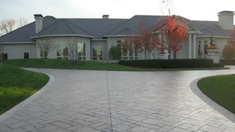 Stamped concrete driveway with cut expansion joints