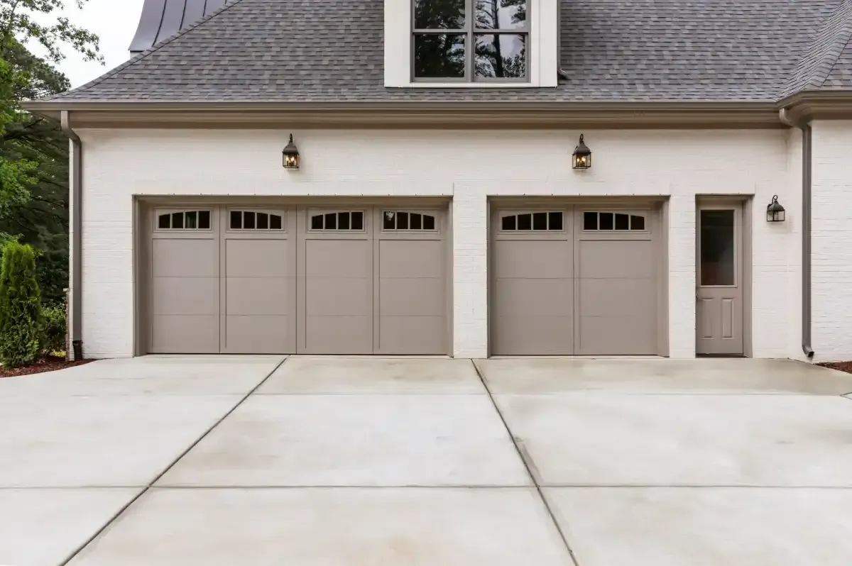 Cut concrete driveway with double garage