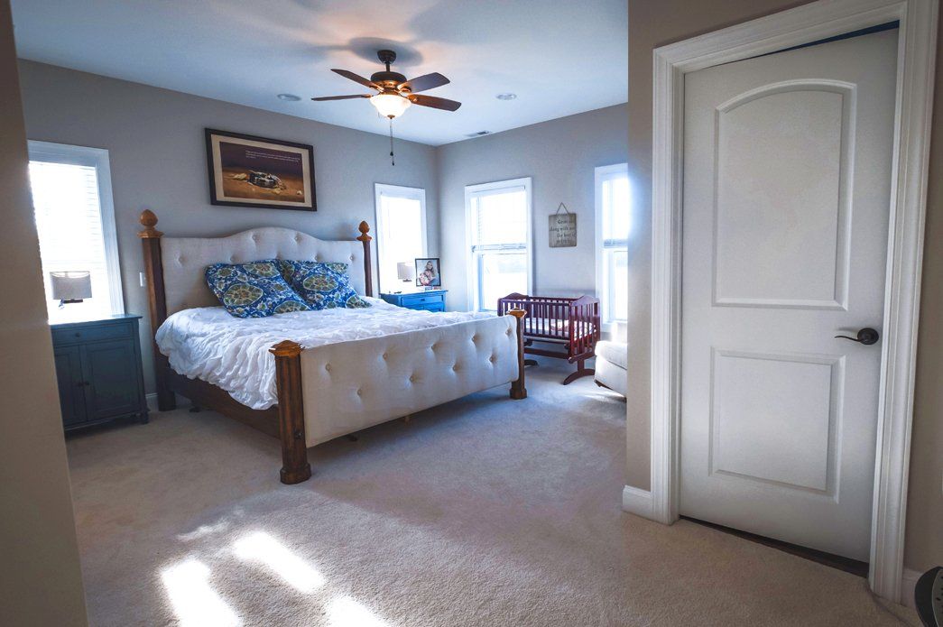 Bedroom with bed | Bay to Beach Builders | Greenwood, DE 19950