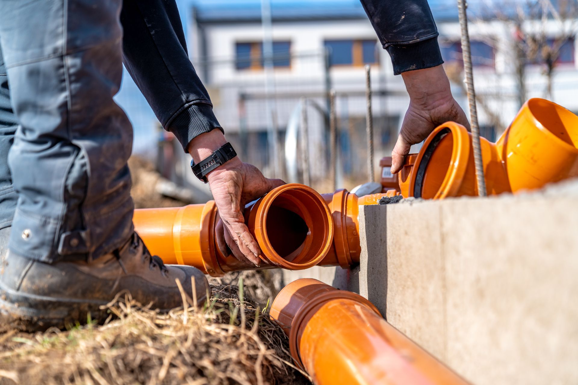 Commercial plumbers completing sewer line replacement at a Holyoke MA business