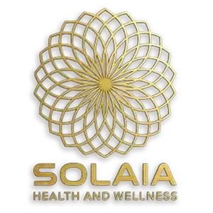 Gold floral mandala logo with the words “SOLAIA HEALTH AND WELLNESS” beneath it