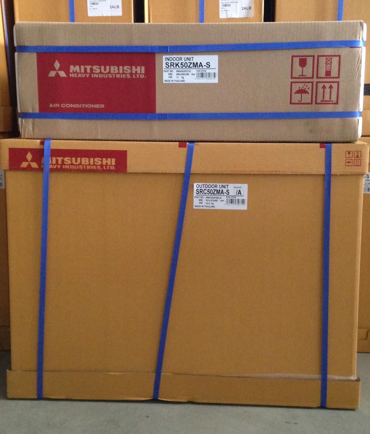 Two Boxes Of Mitsubishi Air Conditioners Are Stacked On Top Of Each Other — Custom Air In Wodonga, NSW