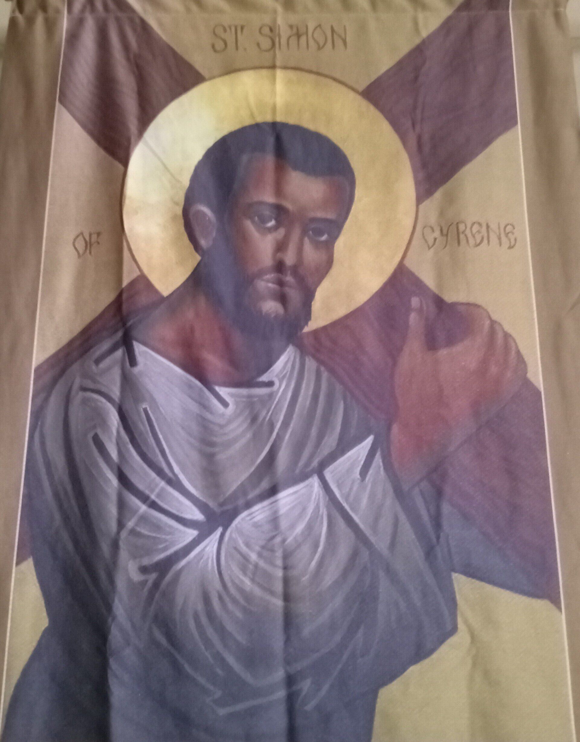 Icon of St. Simon of Cyrene, dark-skinned man carrying a cross, with a gold halo.
