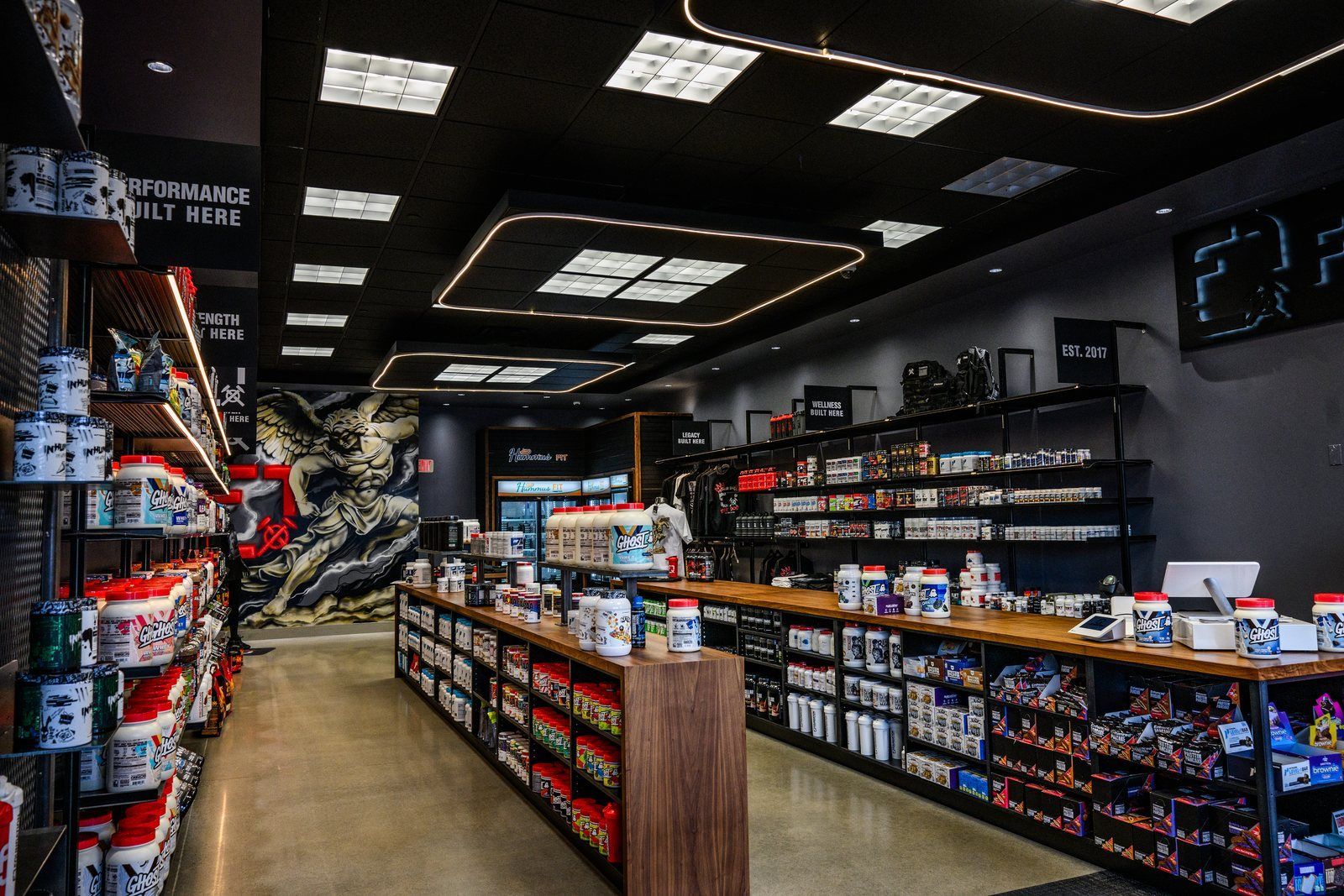 Inside a Foundation store, supplement walls and the checkout counter