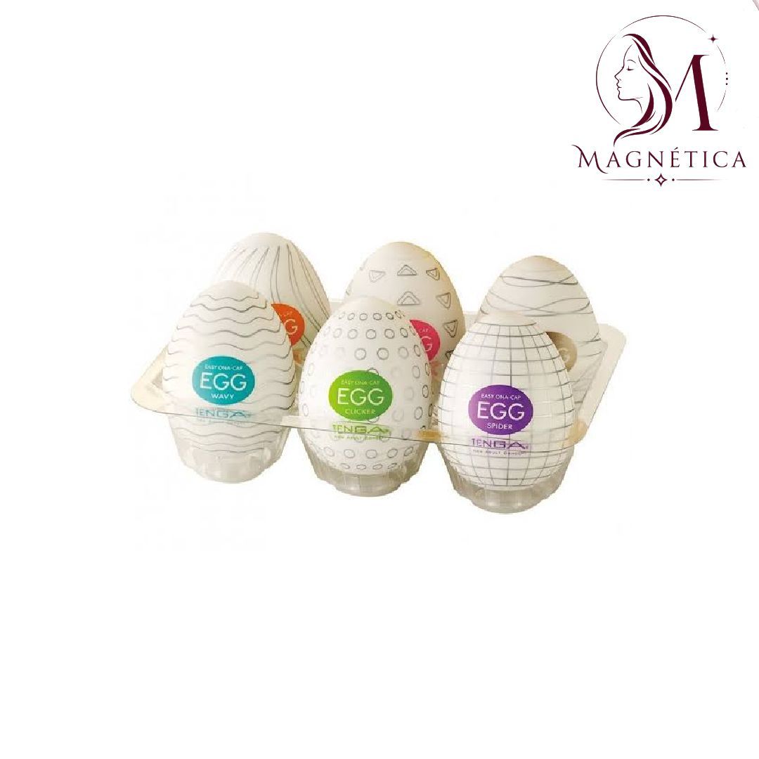 Productos de baño en forma de huevo de color pastel de la marca Magnolia, dispuestos en grupo sobre un fondo blanco.