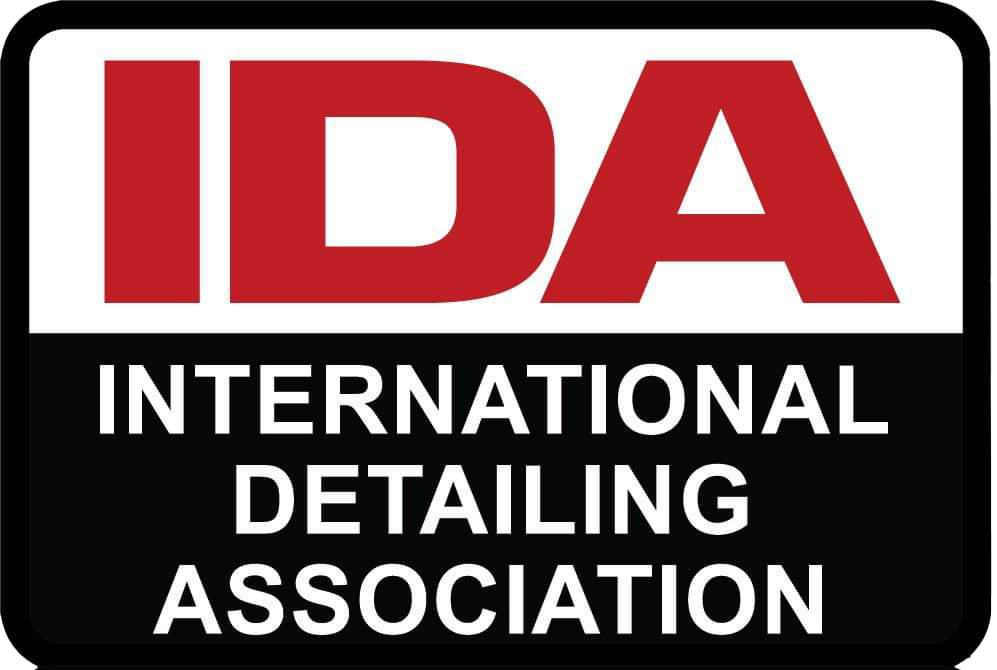 IDA logo: Red IDA text on a black and white International Detailing Association badge.
