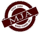 Logo for MJA Wood Floors Inc. featuring the text "SINCE 2000" inside a dark red circular serrated seal.