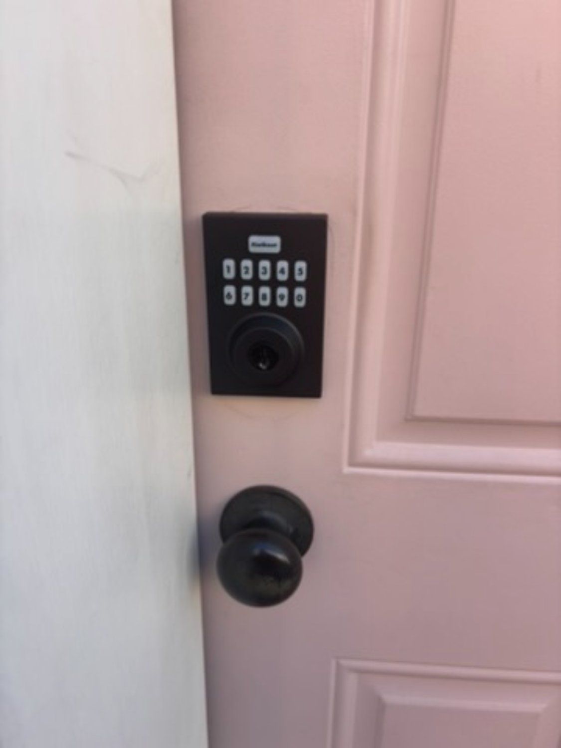 Keypad deadbolt and knob installed on a front door by Pro Local Locksmith in Baltimore