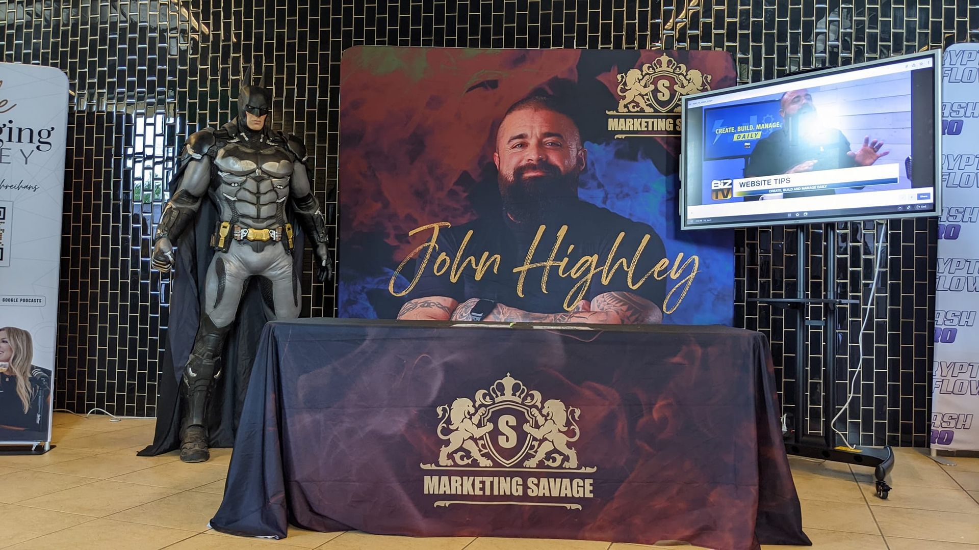 A table with a picture of john highley on it