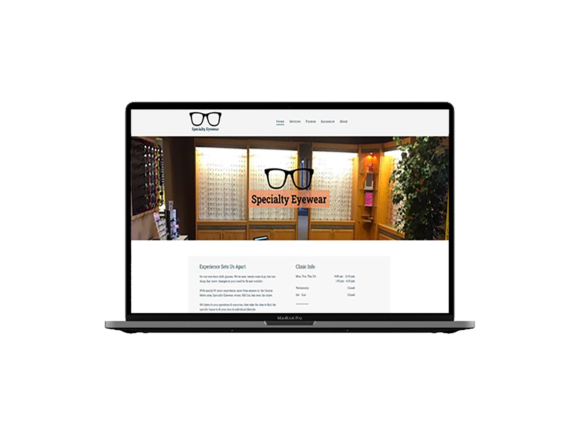 A laptop computer is open to a website for a specialty eyewear store.