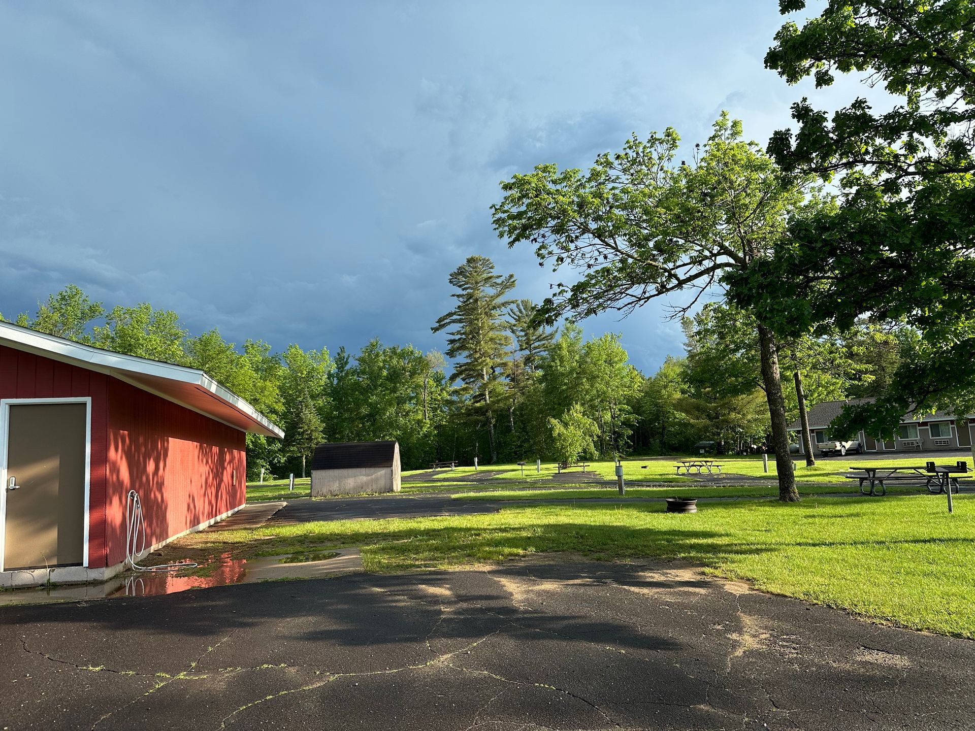 A bathhouse and campground image at Trails Inn. A bathhouse and campground image at the Trails Inn Quadna Mountain Motel & RV Campground.