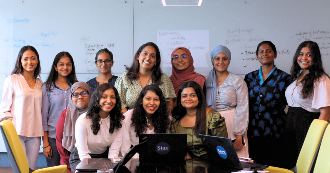 Stax Colombo colleagues gather for a photo after hosting a session on sexual and reproductive health (SRH).