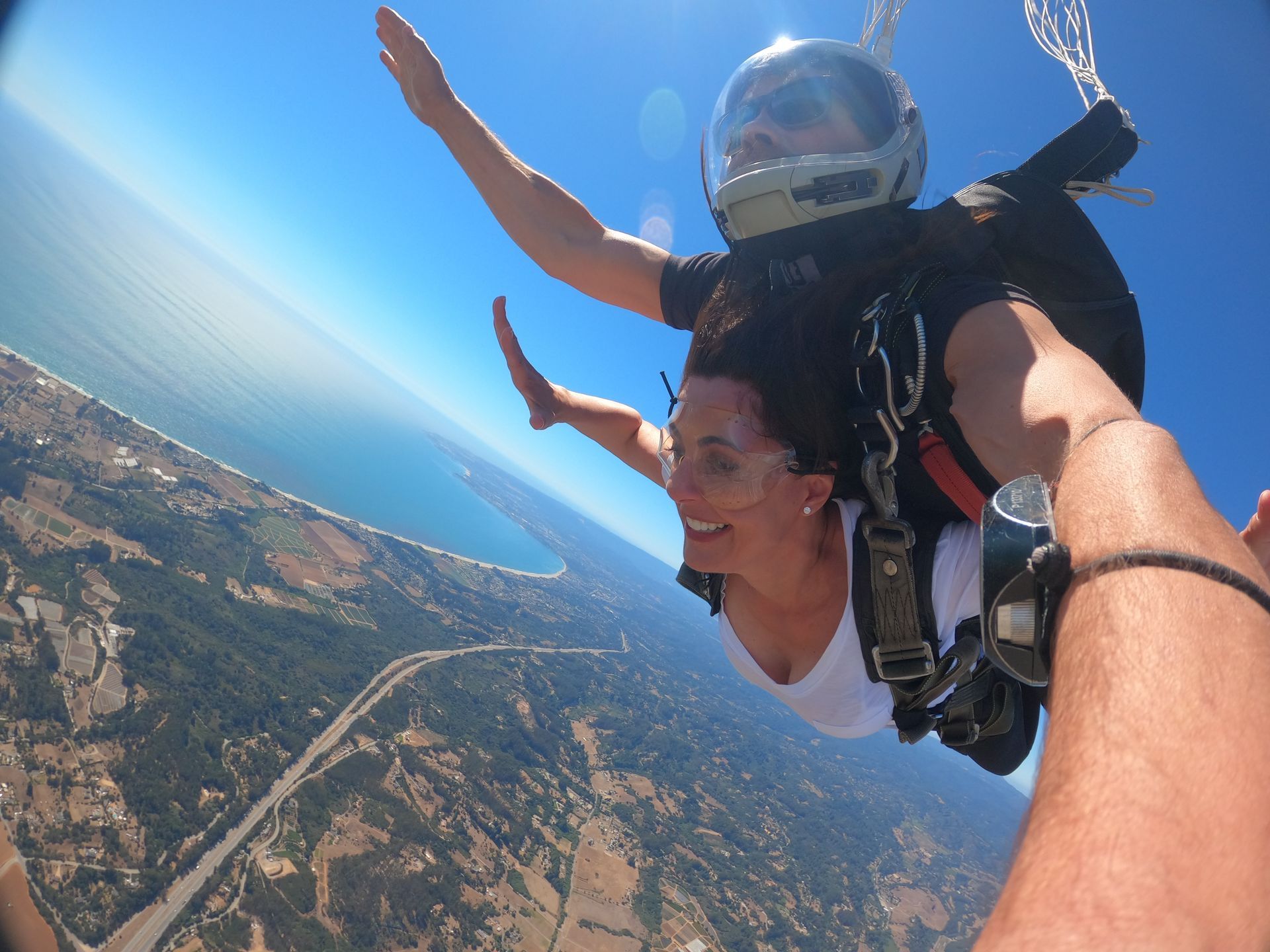 Tandem skydive pair freefalling at Skydive Santa Cruz.