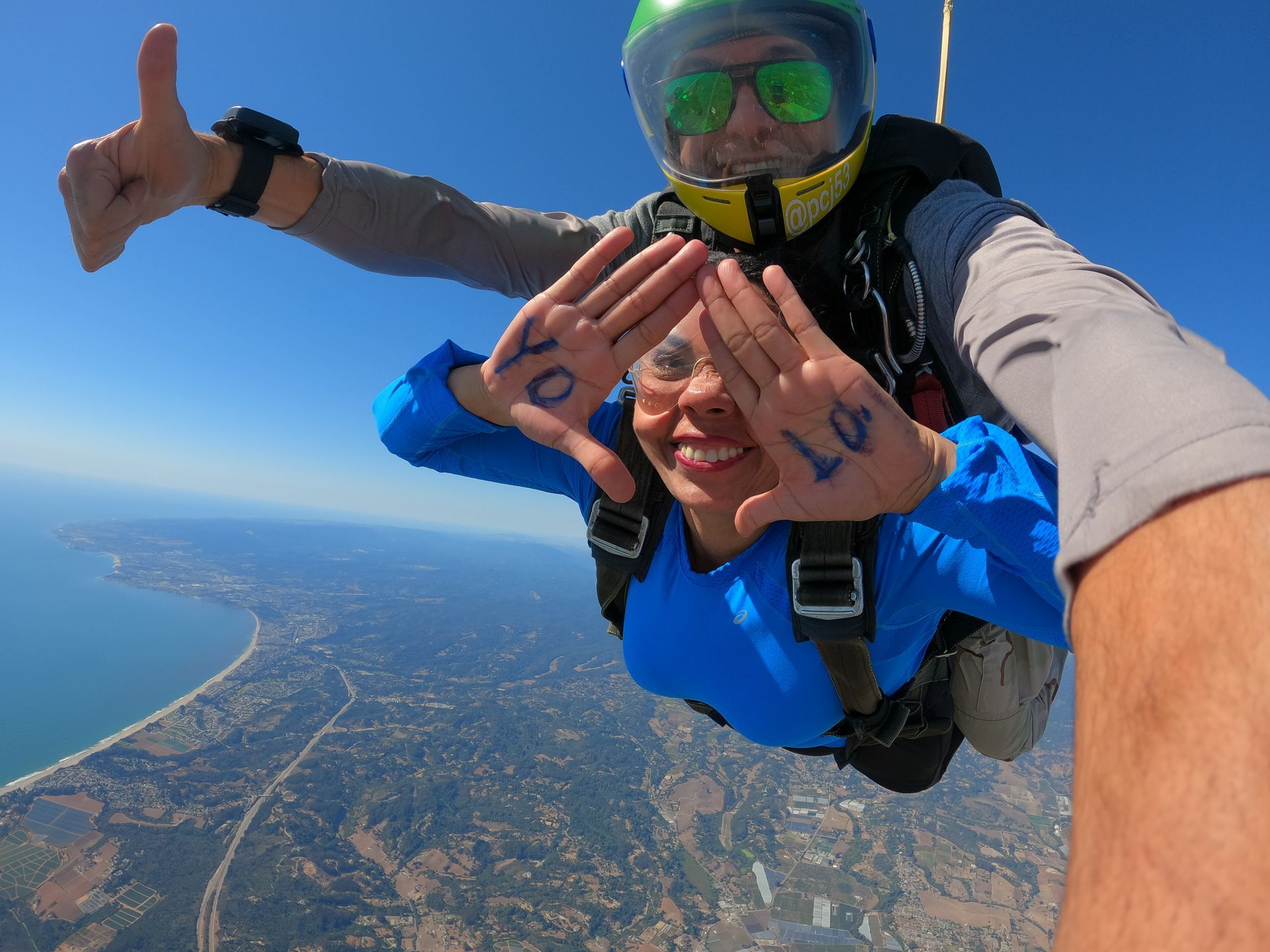 Skydive Santa Cruz Freefall YOLO Hand Sign