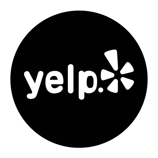 The yelp logo is in a black circle on a white background.