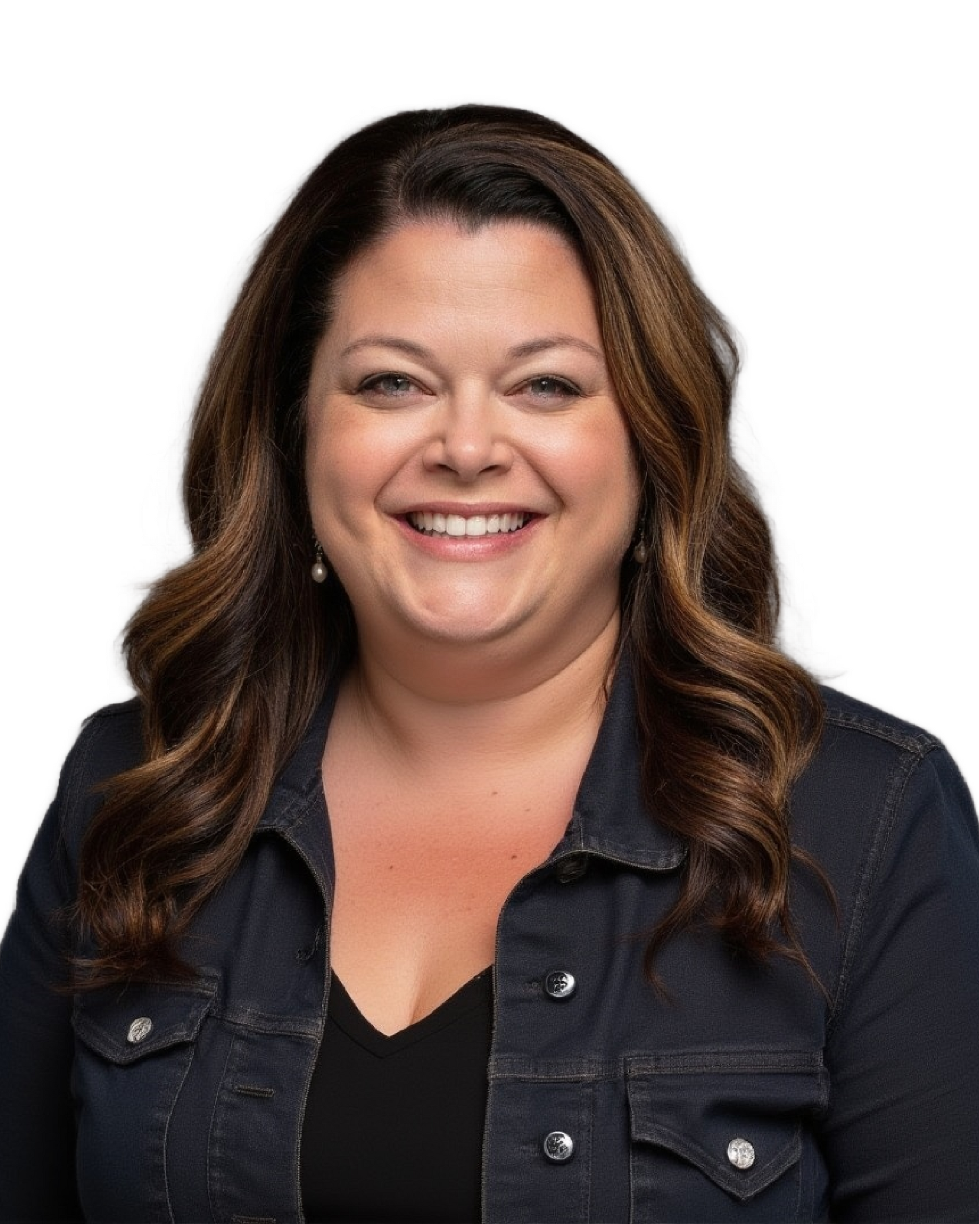 Smiling woman with long wavy hair wearing a dark denim jacket on a white background