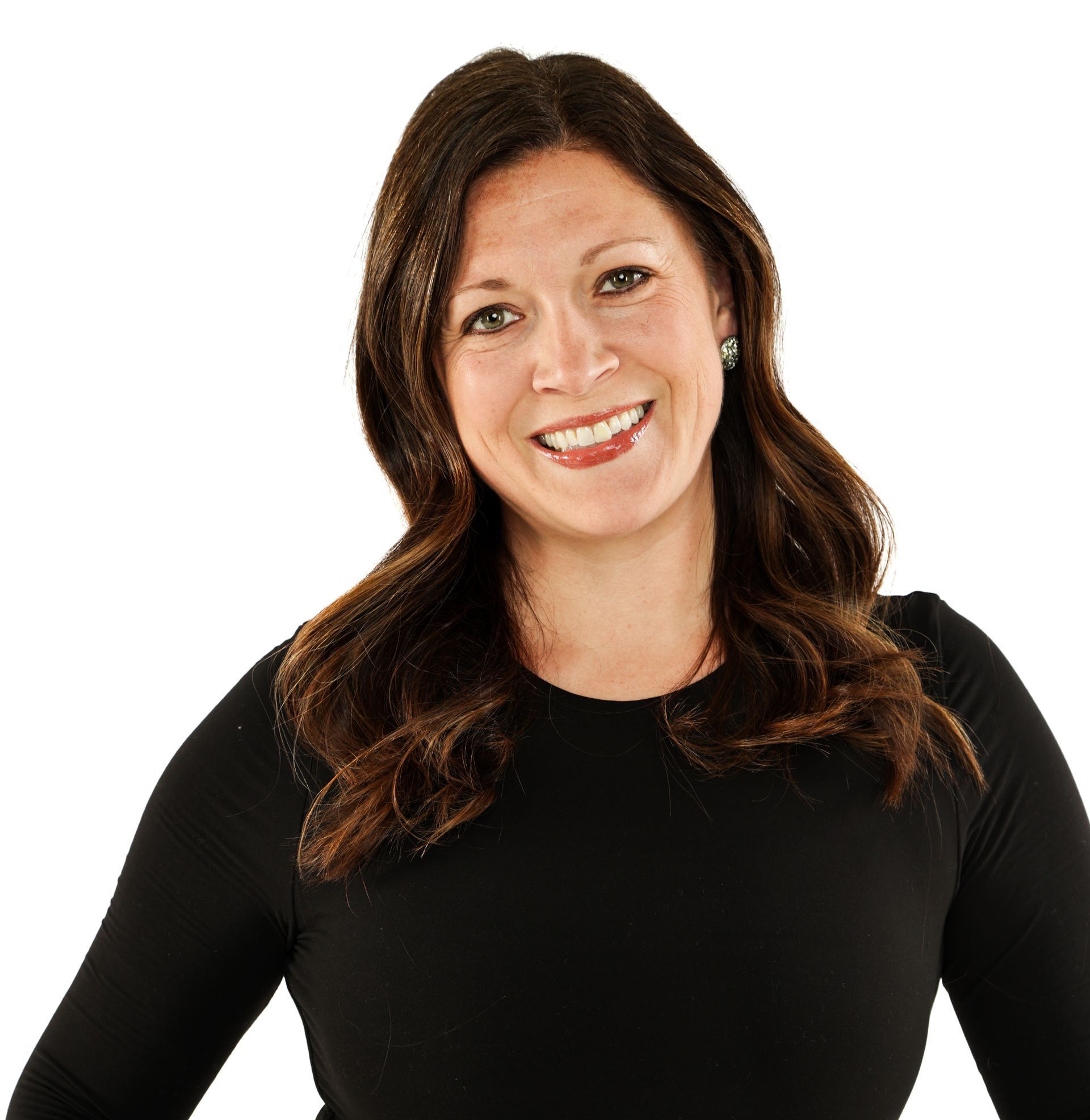Smiling woman with long dark hair wearing a black top against a white background