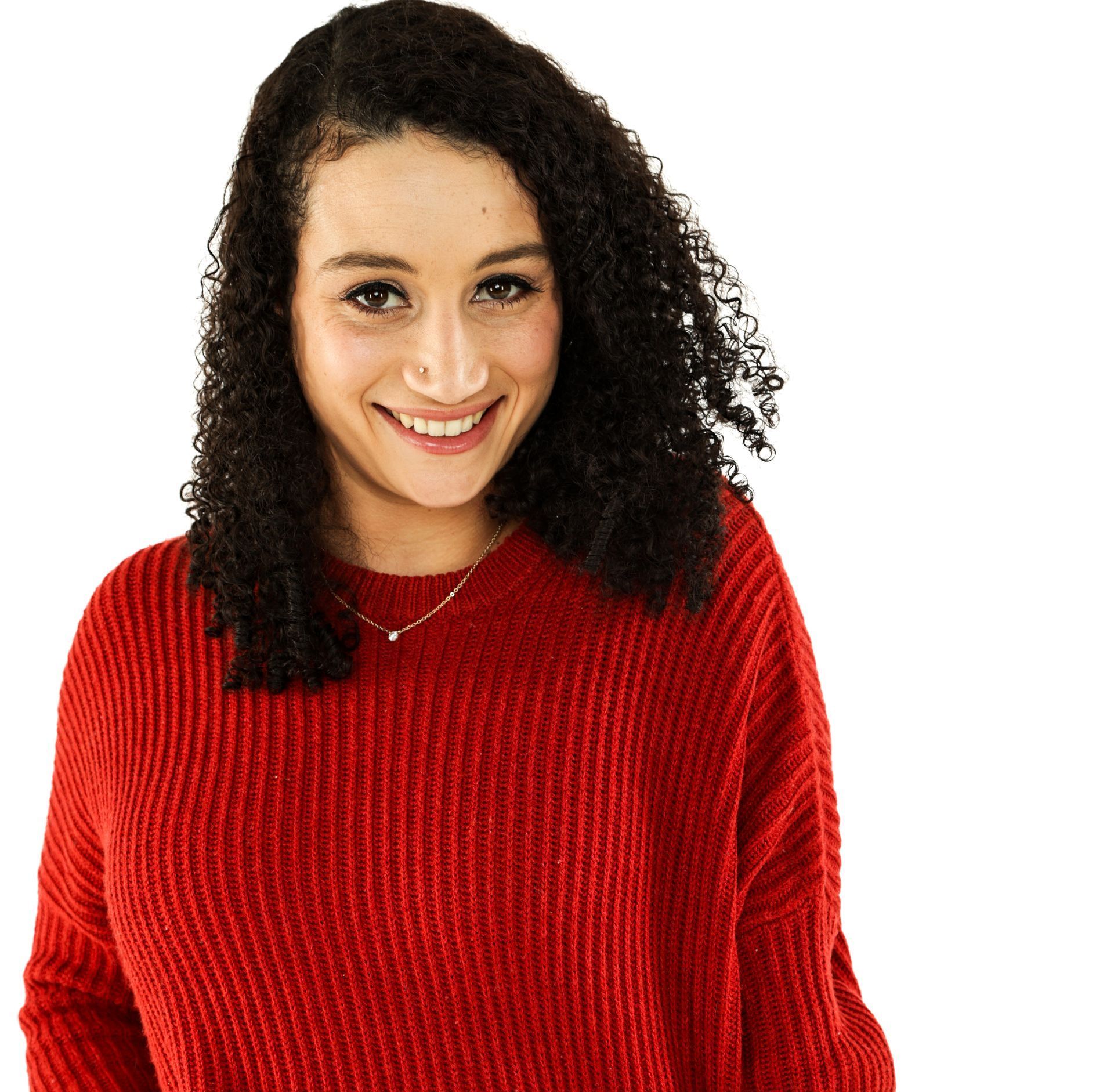 Smiling woman in a red sweater against a white background
