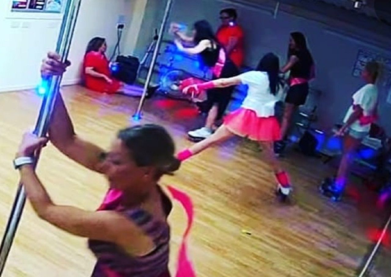 People skating during a hosted roller disco session in a Cardiff studio