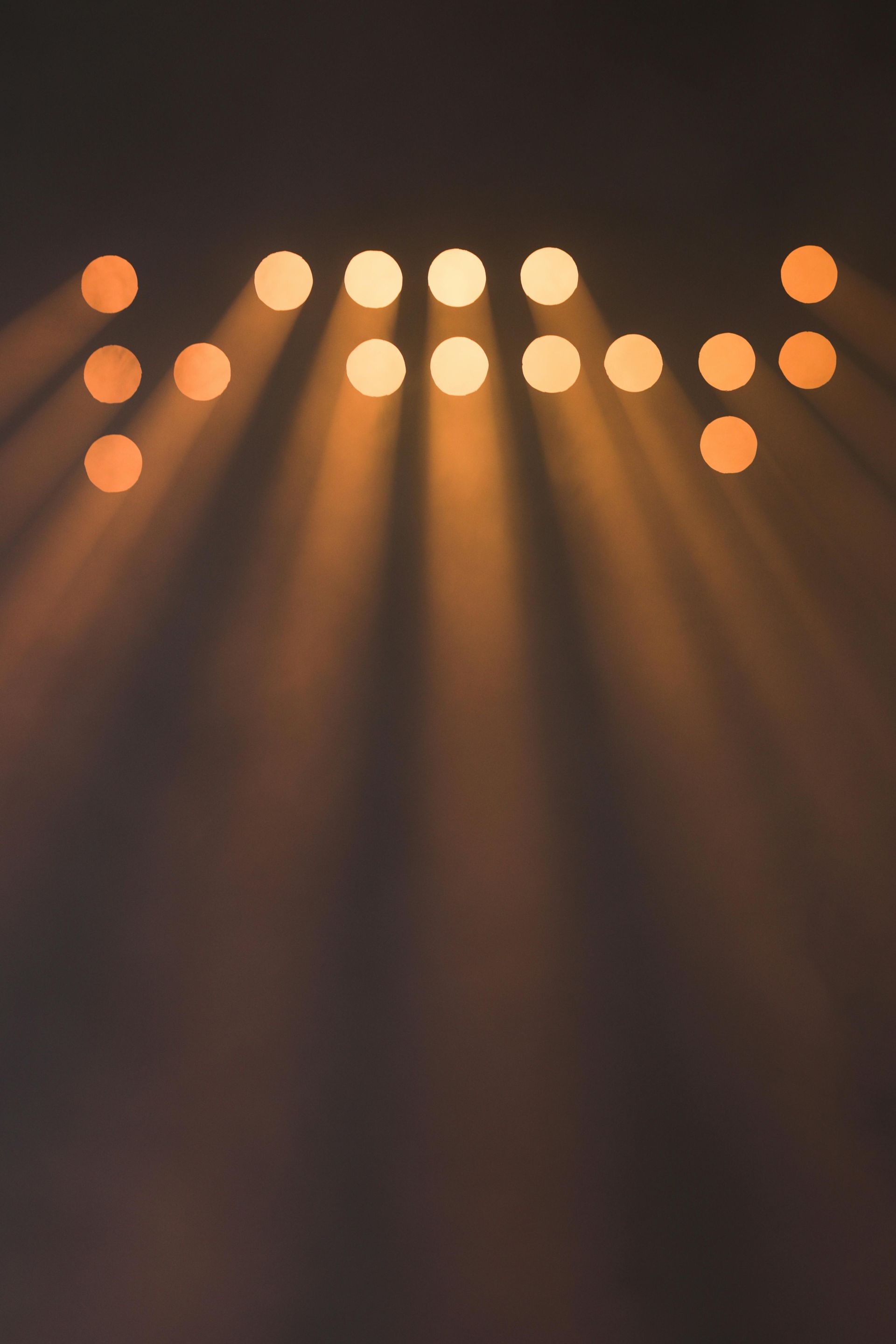 Event highlights showing professional stage lighting and live event atmosphere