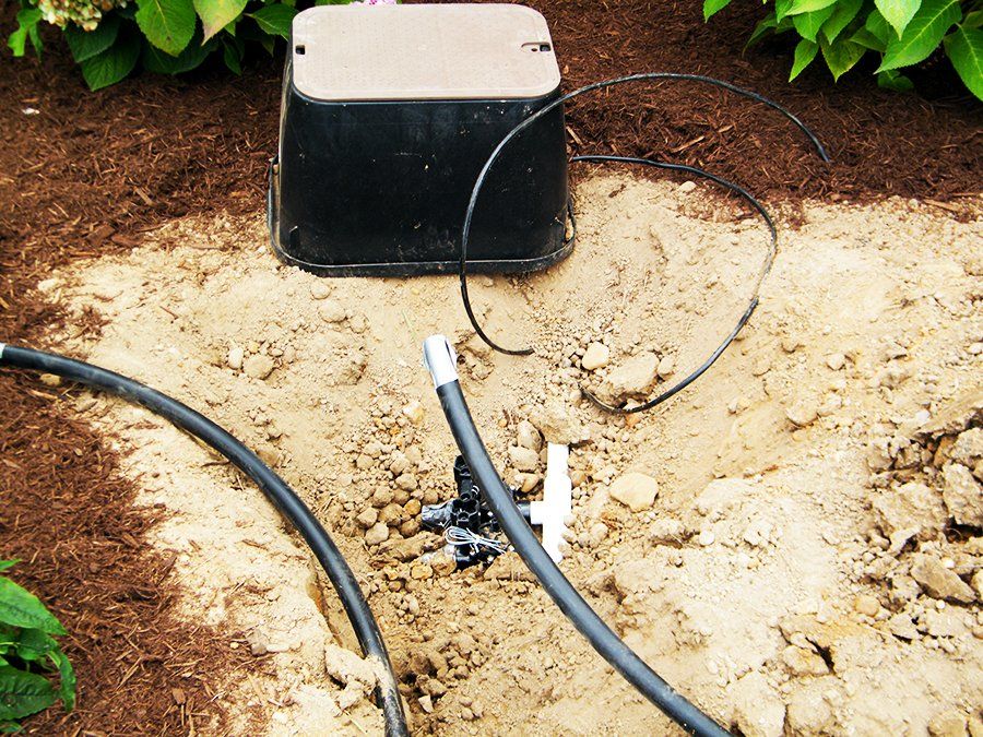 Installing Sprinkler - Canton, OH - Warstler Bros Landscaping