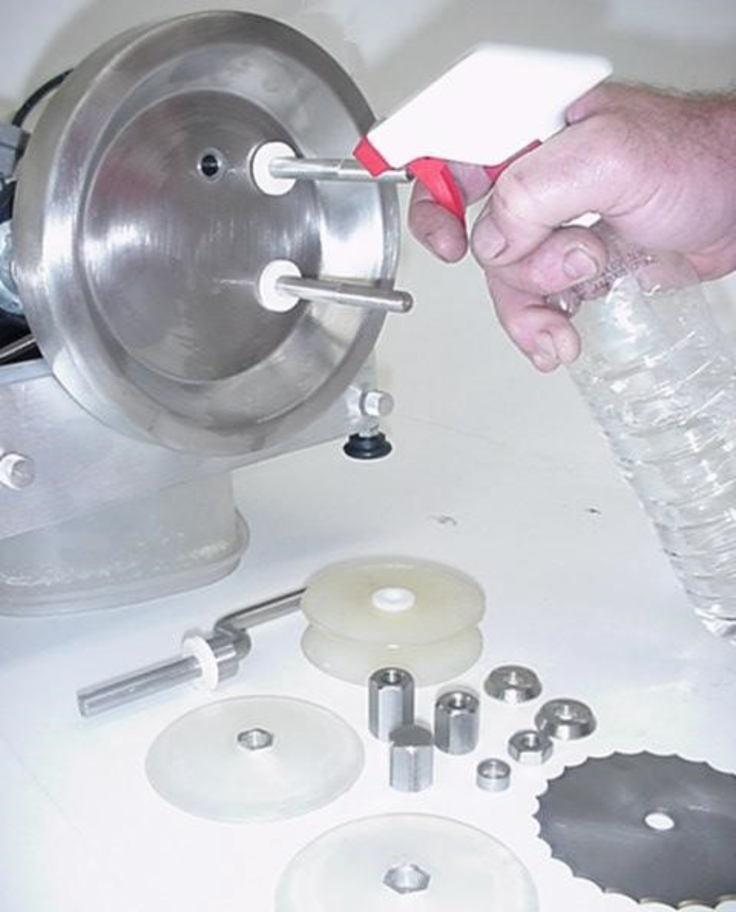Cleaning the MLG-Stainless plate and all parts that come in contact with the shrimp during processing.