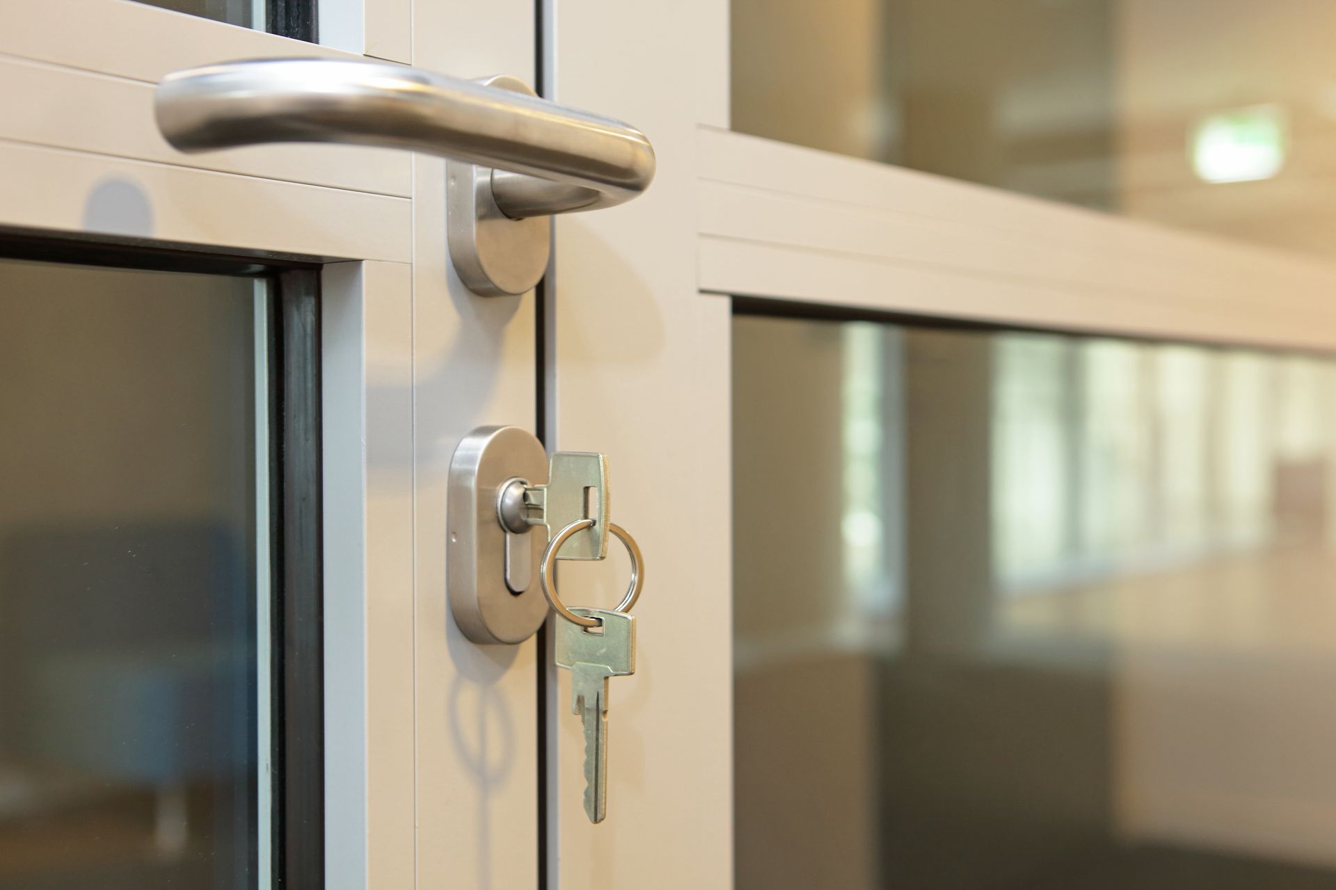 Keys inserted in a lock highlighting security and access control in an office Keys inserted in a lock highlighting security and access control in an office