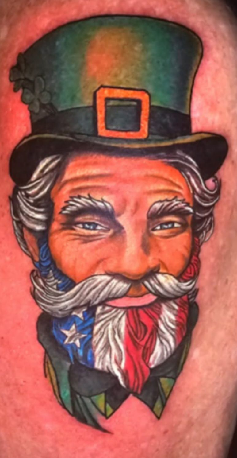 Colorful illustration of a bearded face in a tall green top hat, styled like Uncle Sam.