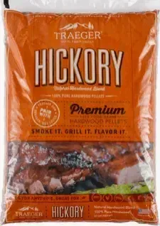 A bag of hickory pellets with a picture of meat on it
