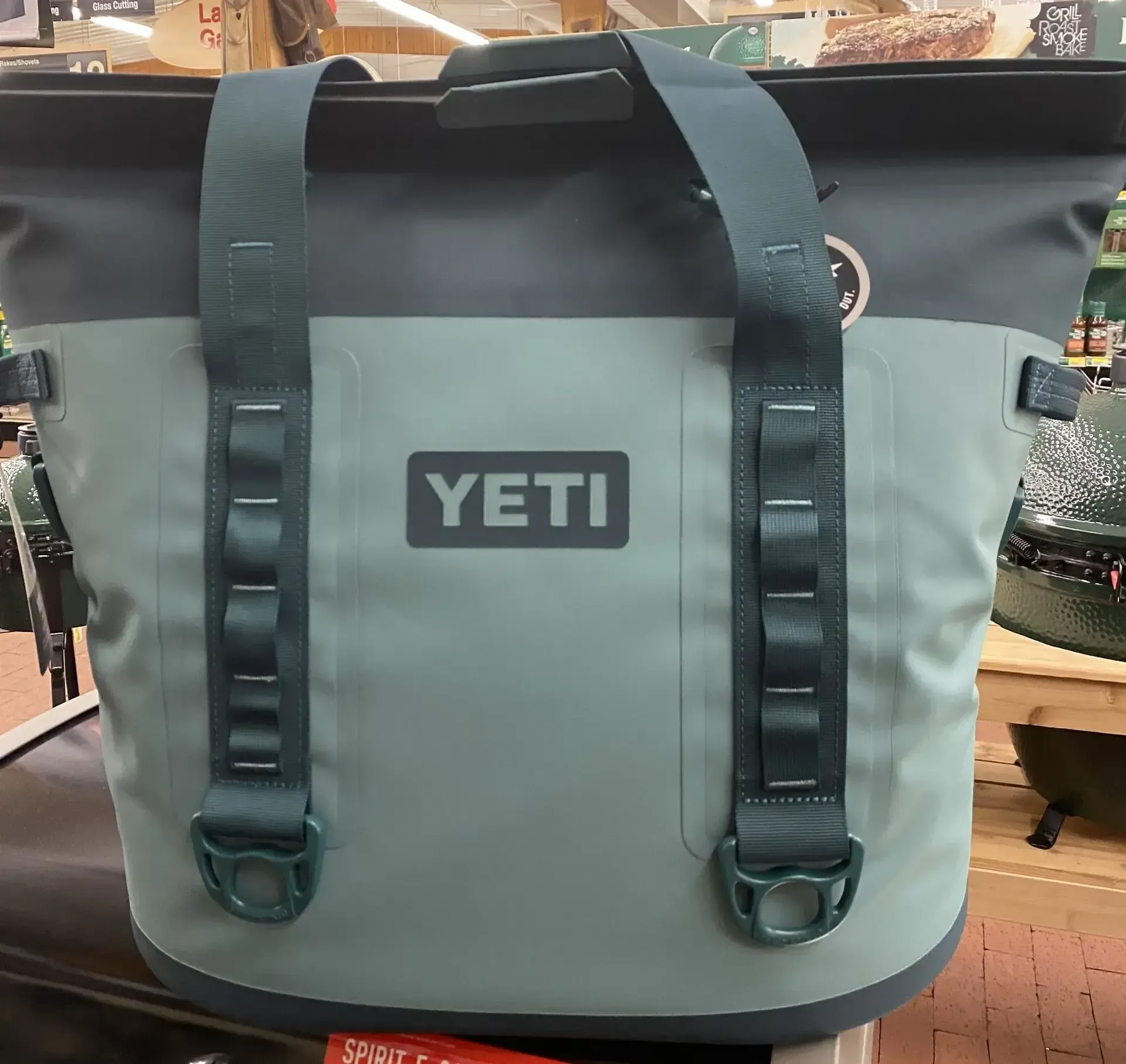 A yeti bag is sitting on a table in a store