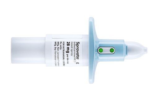 A nasal spray bottle with a green cap on a white background.