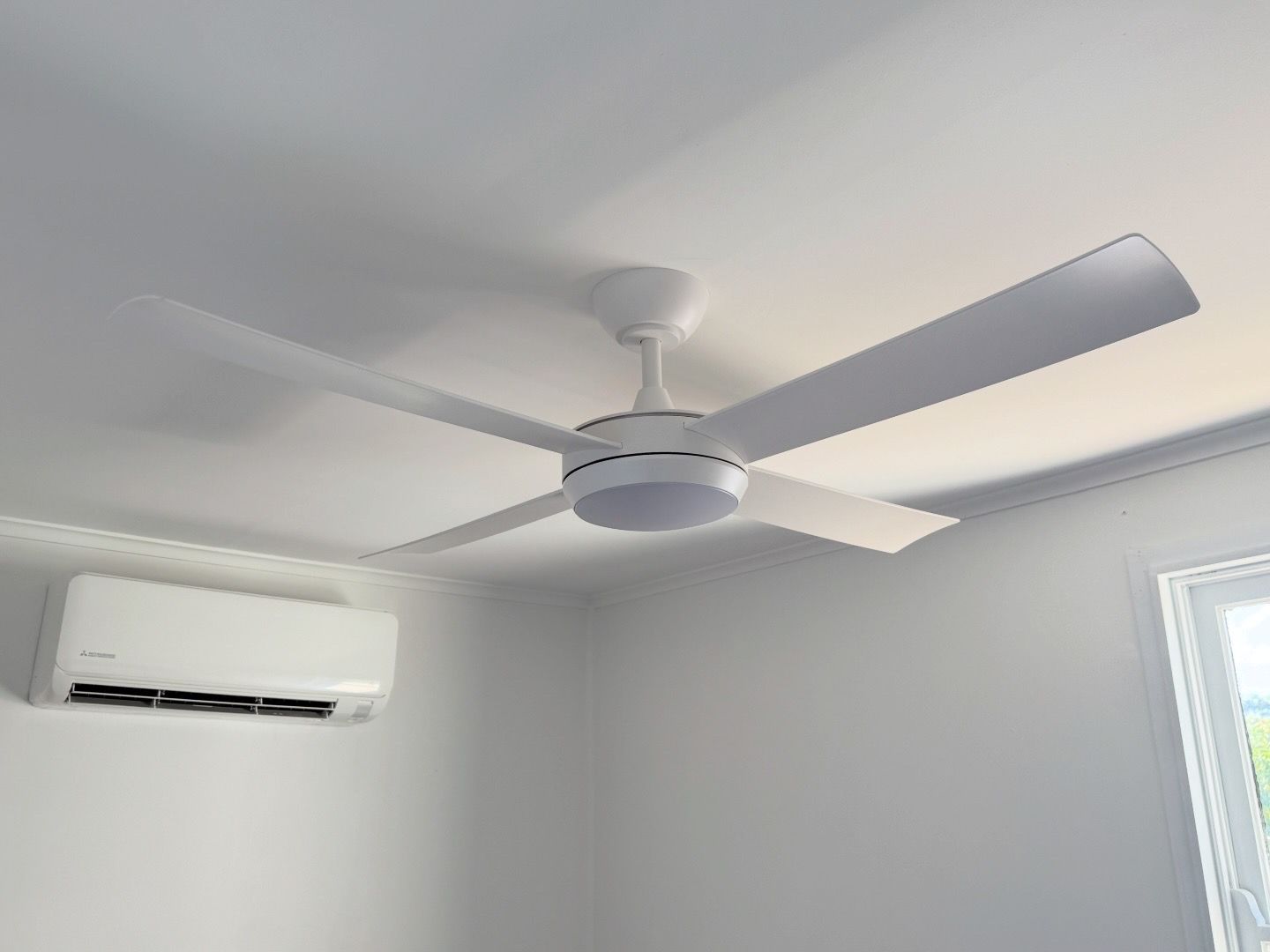 White Modern Ceiling Fan With Light And Wall Mounted Air Conditioner In Bulli