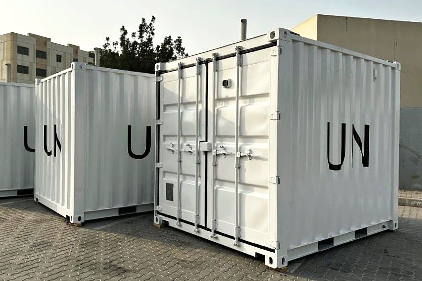 White shipping containers with black