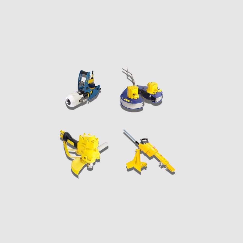 Four pieces of yellow and blue construction equipment against a gray background.