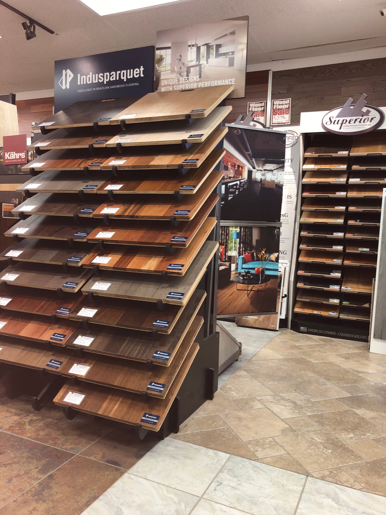 A display of different types of wood flooring in a store