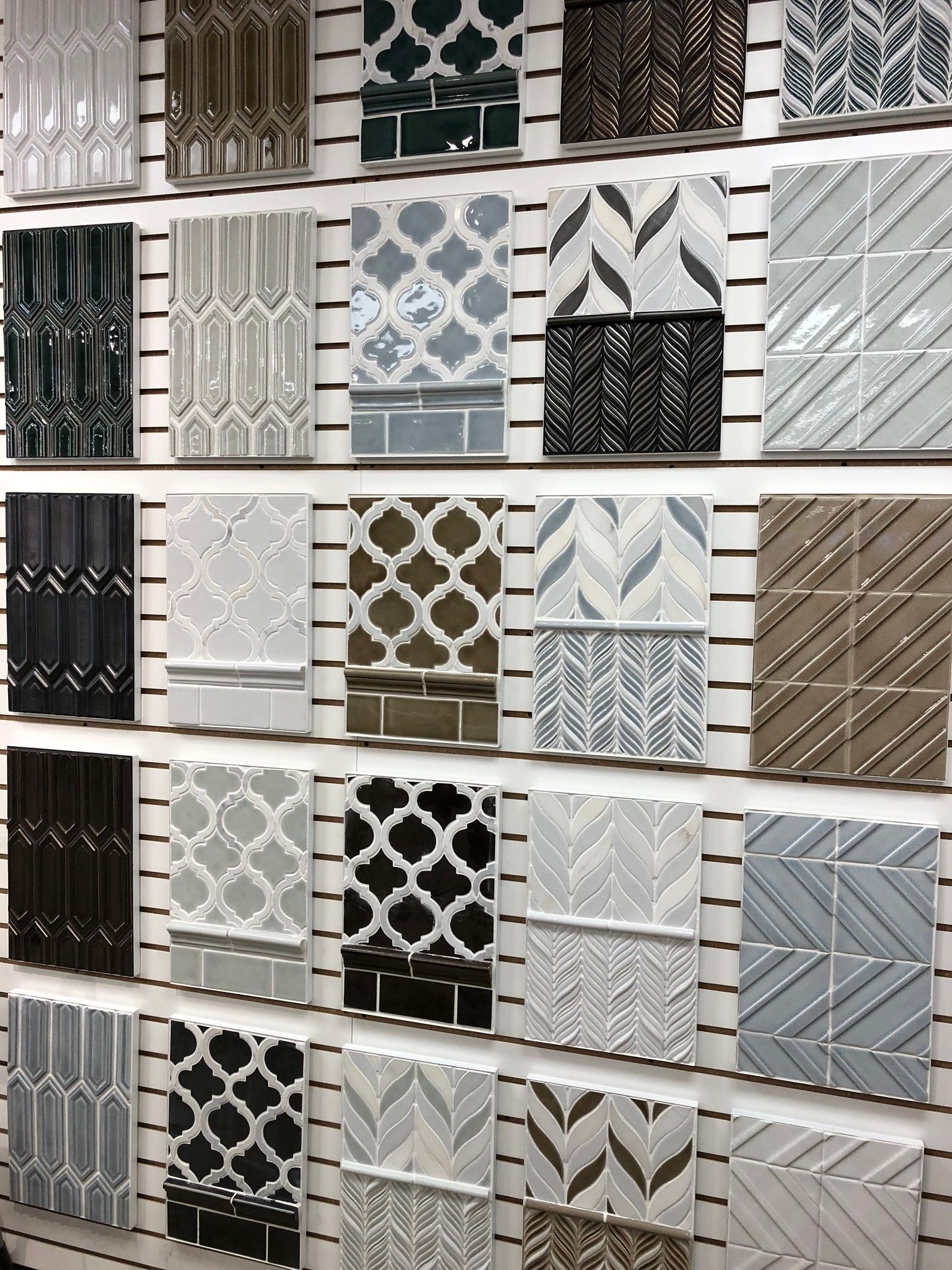 There are many different types of tiles on display in this store.