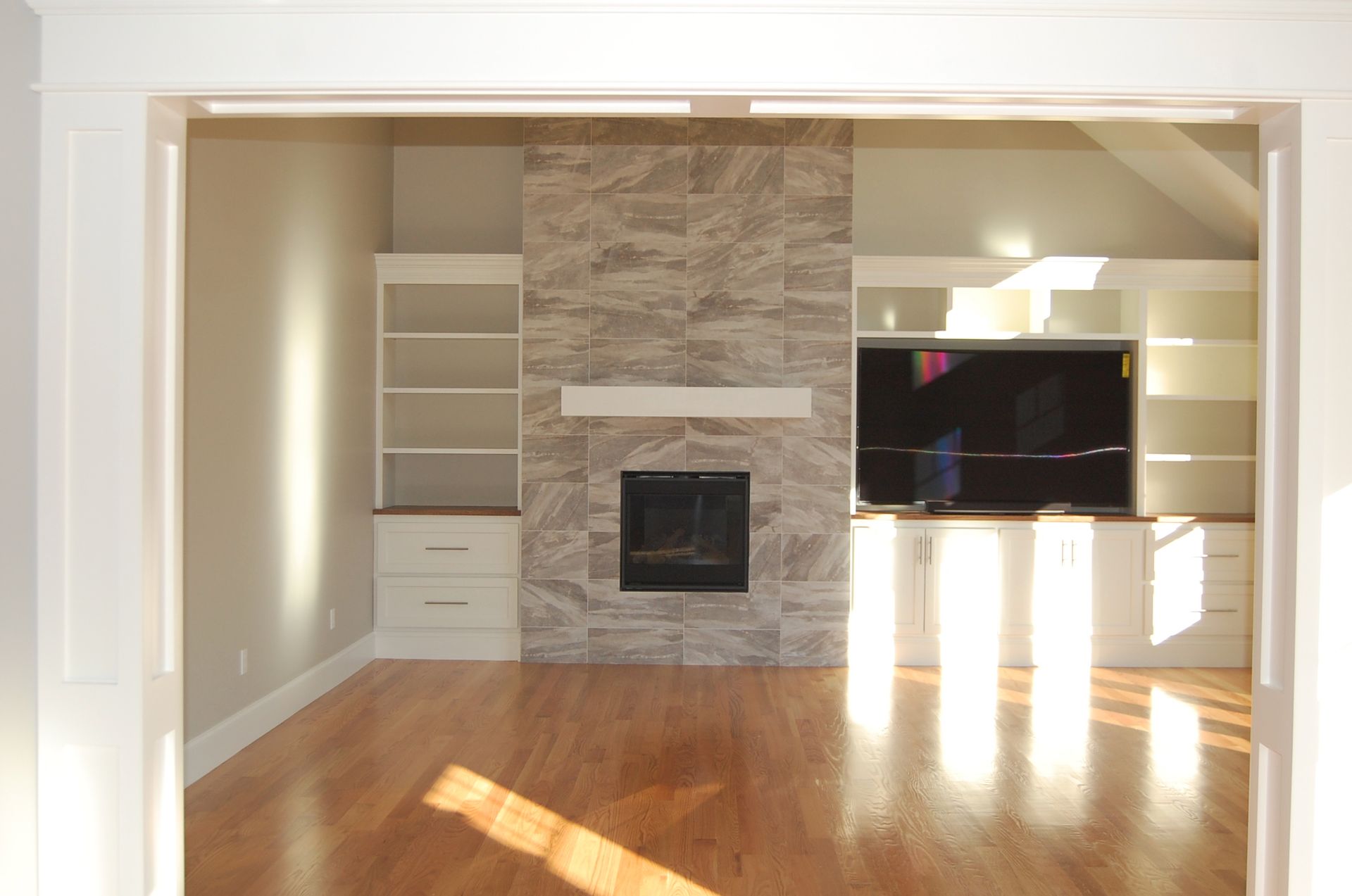 There is a fireplace in the middle of the room.